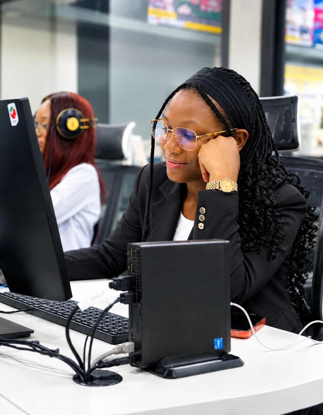 Vida ICT engineer working at workstation in technology operations hub